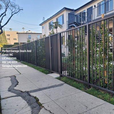 NEW Iron driveway gates & fence in a standard design to secure a residential property