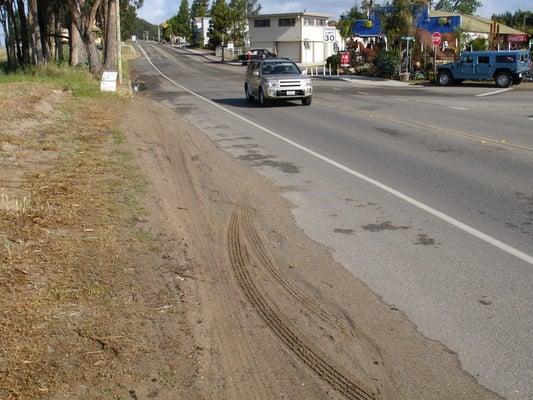 Caltrans debris that they grade into storm water drainage channel!