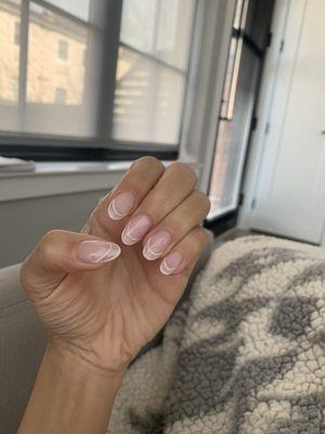 Gel nails with French tip design