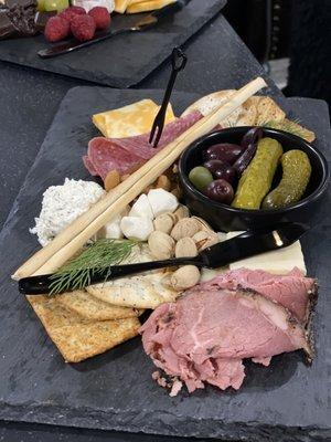 Meat and cheese charcuterie board.