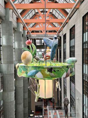 Chandeliers: one of three massive, sculptural chandeliers created by artist Therman Statom representing nature, science and the arts.