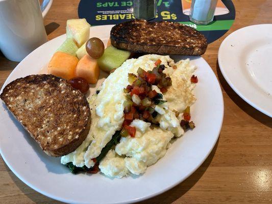 Fit Start Omelet is made with  three egg whites, mushrooms, spinach, tomatoes, bell peppers, red onions, housemade salsa. Super Yum!