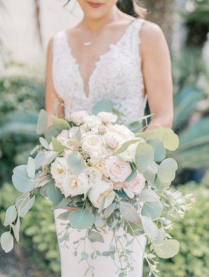 Bridal bouquet with david austin roses, blush bombastic spray rose, lisianthus, cream spray roses and variety of eucalyptus