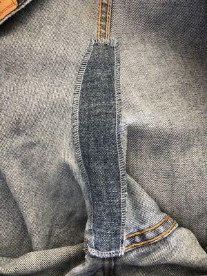 The patching Dina did on the inside of the Levi's.