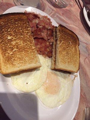 2 eggs, toast, hash. I would skip the hash...