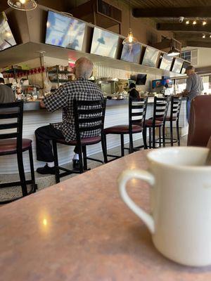 One of the popular regulars at the restaurant. Everyone seemed to recognize him from the back.