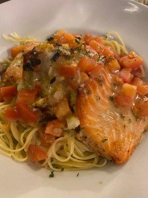 Salmon stuffed with lobster over linguine.