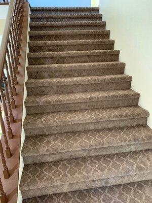 Extra wide stairs and a difficult pattern made to look easy by KC Floors!