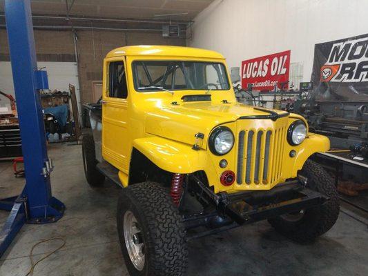 '58 Willys Custom Project:
  custom cage, custom dash/interior, Atlas 4-speed transfer case, ARB air lockers, new exhaust system and more.