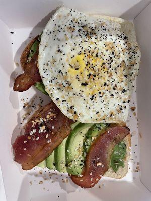 Avocado toast, added bacon and eggs