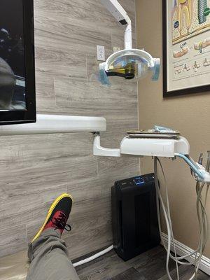 Having an X-ray  done and adjusting my root canal tooth.