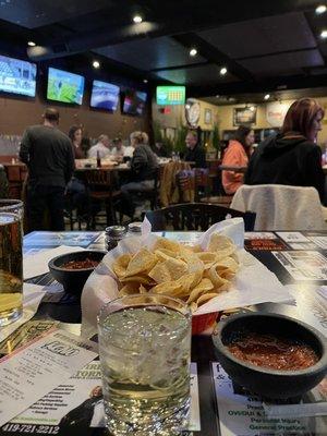 Margarita on the rocks. Guy playing guitar and singing.