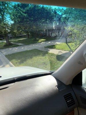 Dirty windshield - they only cleaned half the window.