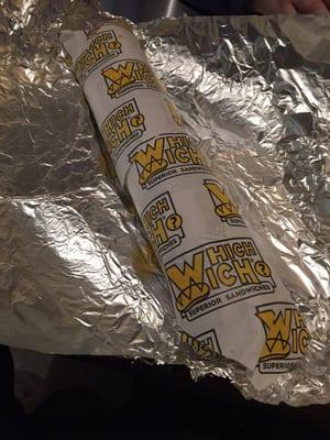 Sandwich comes wrapped in paper and then on foil. Great for transportation without losing any of the goodness inside!