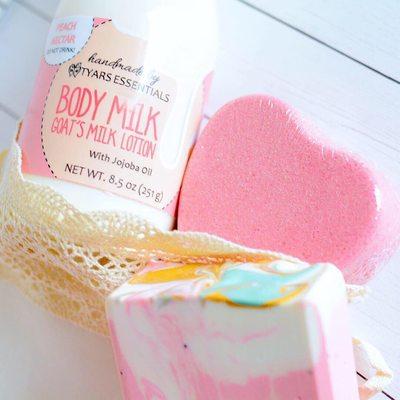 Handcrafted Body lotion with creamy goats milk and jojoba oil. Heart shaped bath bomb, and body soap.