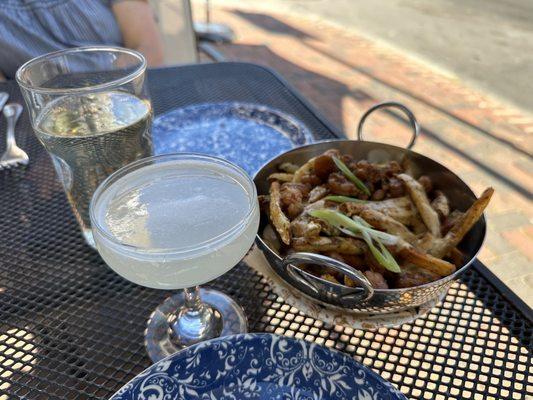 Happy hour. Well made gimlet. And generous snacks