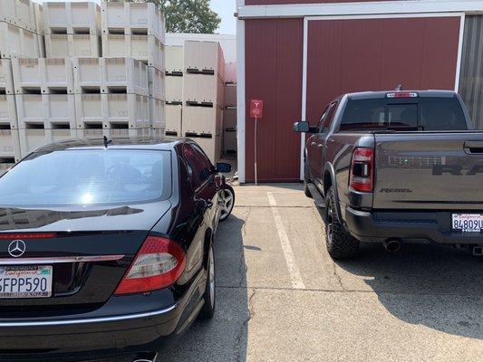 Nearby EV charging station with reserved parking. But apparently Mercedes and Ford pickup drives excluded from the rules.