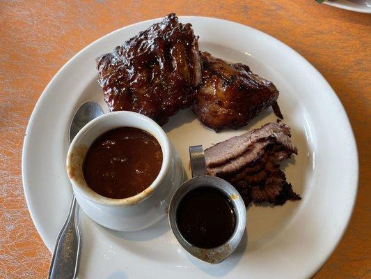 3 item plate: Baby Back Ribs, sliced brisket & bbq chicken with bbq beans