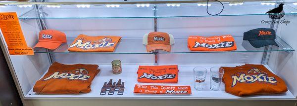 Moxie is the official soft drink of Maine! We carry t-shirts, sweatshirts, hats & more in addition to cold cans of Moxie for you to try.