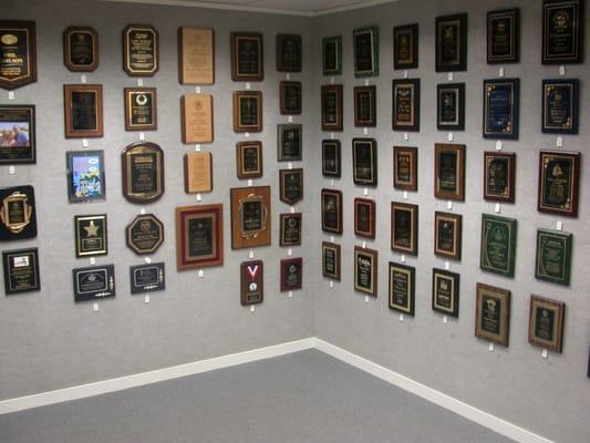 Anderson Trophy showroom plaques on display.