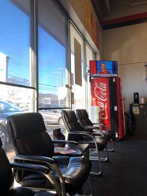 Seating and TV and Coke