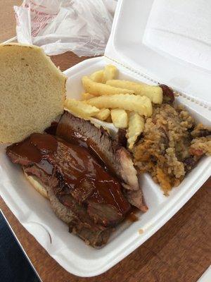 Sliced brisket sandwich combo with sausage rice dressing and French fries 7.99