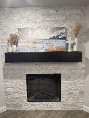 Custom stone wall and mantle.