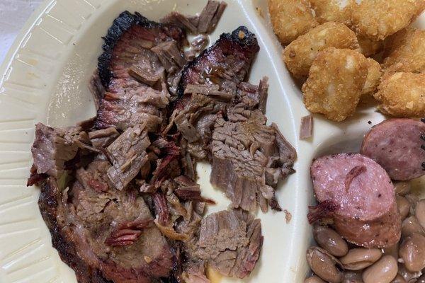 Just look at the juiciness and smoke ring on that brisket.