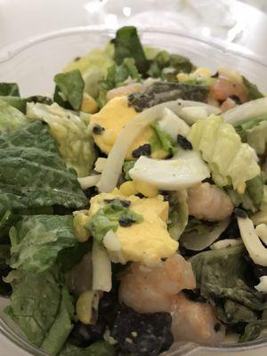 Southwest salad with shrimp and an egg