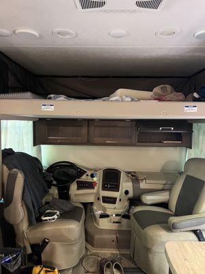 Bunk that comes down over driver's seat