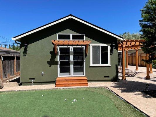 Note the beautiful pergola and trellis that GKW designed