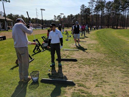 This is a heavily utilized driving range. Notice the lack of grass by midday.