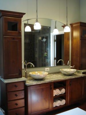 The fulfillment of the client's desire for an earthy, spa-like master bath.