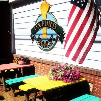 Tables out front for taking lunch, dinner, or ice cream outside