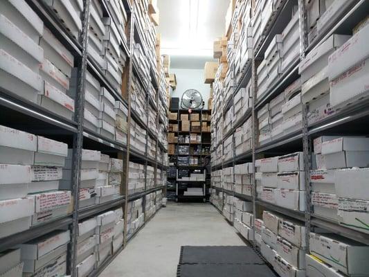 Our Backroom with millions of single sports cards.  Please order online rookieshq.com