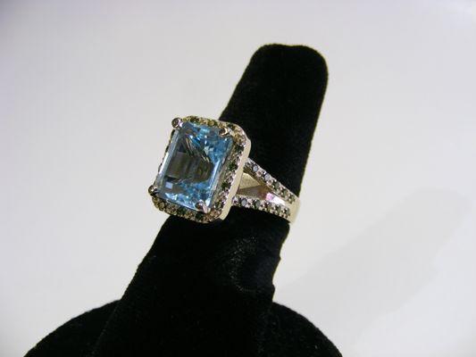 Custom CAD design- Blue topaz and green diamond ring in 14k white gold.