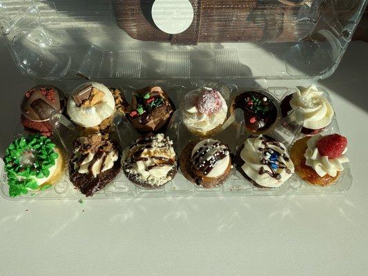 Mini dozen specialty cupcakes for $18. All fantastic, especially the ones that are stuffed! Or anything cheesecake!