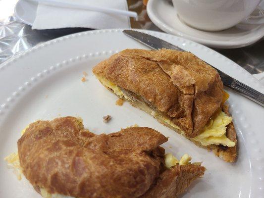 Sausage, egg, and cheddar cheese croissant. Delicious! The croissant was buttery.