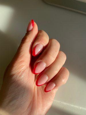 Acrylic on natural nails with red tips