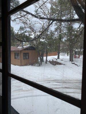 Outside on the front porch of Cabin 8