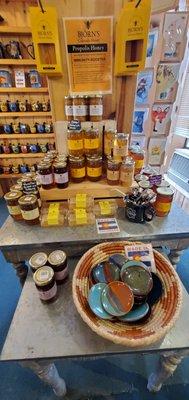 Large display of many flavors of local honey.