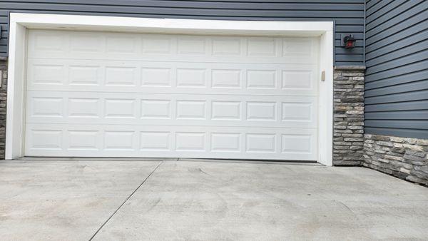 Look how crooked my garage door is... oh wait no, that is the joke of concrete job!