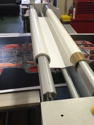 Laminating in progress on our Seal 80s, 80" mounting and laminating press.