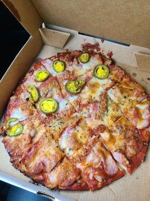 Meat Lovers Pizza (jalapeños added to half)