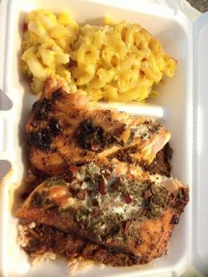 Jerk salmon with rice and peas and Mac and cheese.