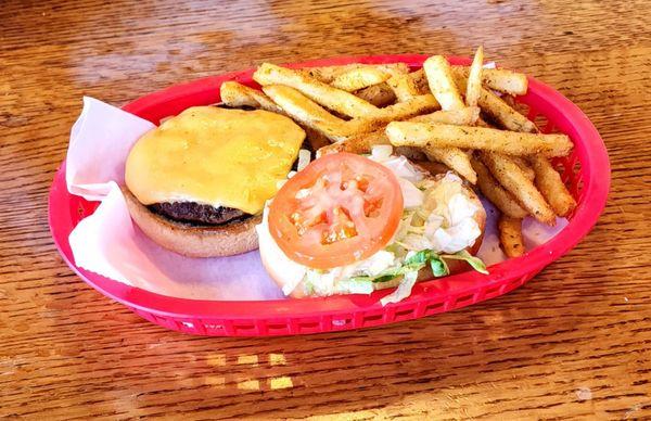 ¼ burger fully dressed in cheese and seasoned fries