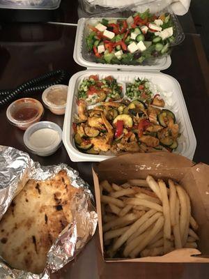 Chicken shwerma, green salad, some garlic fries, and free pita comes with plate