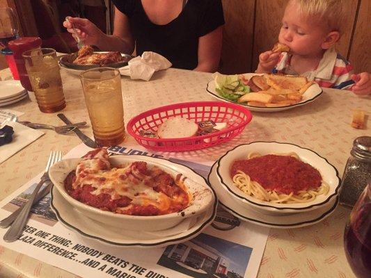 Amazing chicken parmigiana and a grilled cheese appreciated by even the most discernible of pallets in the background.