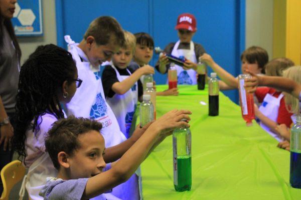 Curious kids enjoying science experiments