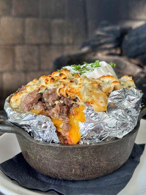 Loaded Baker behemoth baked potato with steak